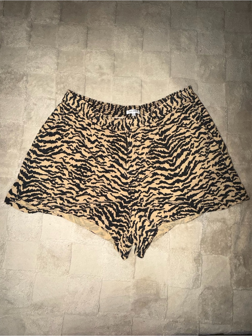 Good American High Waist Zebra Print Shorts in Tan and Black
